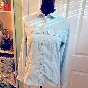 Pale blue, button down, long sleeve, SPF shirt from Eastern Mountain Sports.
